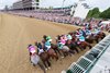 The field breaks from the gate in the 2023 Kentucky Derby at Churchill Downs