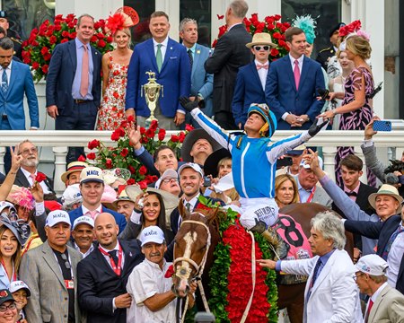 Mage and his team after winning the Kentucky Derby at Churchill Downs