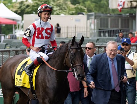 Jose Ortiz aboard Marketsegmentation after winning the New York Stakes at Belmont Park