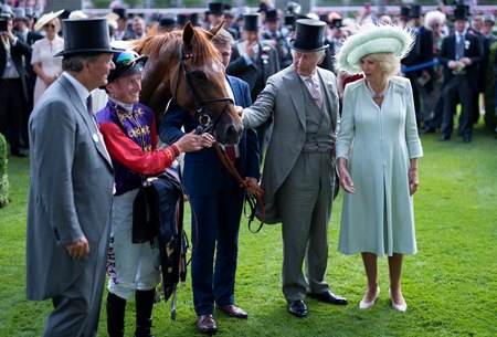 King Charles (second from right) and Queen Camilla (far right) with Desert Hero after his victory at Royal Ascot 