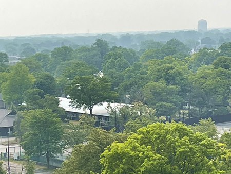 Smoke from wildfires in Canada forms a haze over the Belmont Park backstretch and Elmont, N.Y. June 7