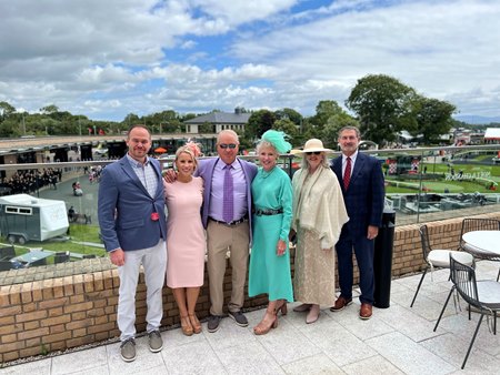 (left to right) Jeff Hyer, Molly Hyer, Louis Brooks, Charlotte Brooks, Carolyn Lawrence, and Jay Lawrence attend the Irish Derby