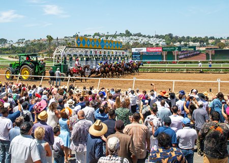 Horses break from the gate at Del Mar