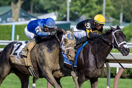 Wet Paint (outside) rallies to defeat Sacred Wish in the 2023 Coaching Club American Oaks at Saratoga Race Course