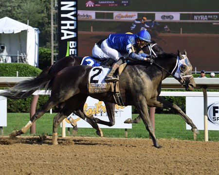 Wet Paint wins the Coaching Club American Oaks at Saratoga Race Course