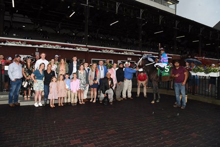 Callie's Grit and her connections in the winner's circle at Saratoga Race Course