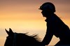 sunrise as horse gallops
Saratoga training at Saratoga Racecourse on Aug. 23, 2023.  





