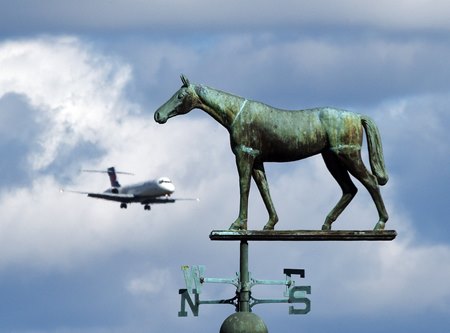 A plane landing at Blue Grass Airport in Lexington