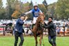 Jockey Harrison Beswick rubs the head of owner/trainer Todd McKenna after Noah And The Ark won the Grad National Steeplechase during the 102nd running of The Far Hills Race Meeting Saturday Oct. 21, 2023 in Far Hills, N.J.