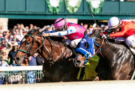 Raise Cain (outside) rallies to defeat Dr. Venkman in the Perryville Stakes at Keeneland