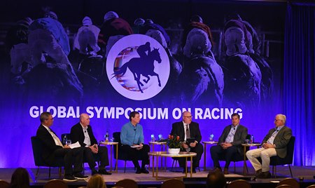 The panel discusses track closures during the Symposium on Racing in Tucson, Ariz.
