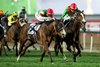 Facteur Cheval (Maxime Guyon, right) beats Namur in the Dubai Turf
Dubai 30.3.24 Pic: Edward Whitaker