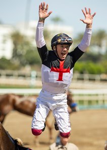 Frankie Dettori celebrates after his win on Nothing Like You in the Santa Anita Oaks as part of his six-win day at Santa Anita Park