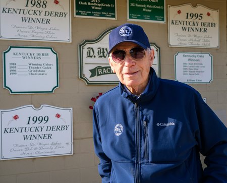 D. Wayne Lukas outside his Churchill Downs barn adorned with signs recognizing many of his top wins