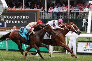 Ova Charged (inside) wins the Unbridled Sidney Stakes at Churchill Downs