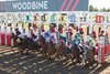 Jockeys (L) David Moran (#5 blue silks), father, and Pietro Moran  (#2 White silks green black), son break from starting gate for the 1st time riding against each other at Woodbine Racetrack