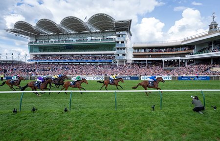Notable Speech wins the Two Thousand Guineas over Rosallion (yellow silks) at Newmarket