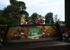 (L-R): Charissa Thompson and Chris Fallica speak during FOX's coverage for the 2023 Belmont Stakes at Belmont Park