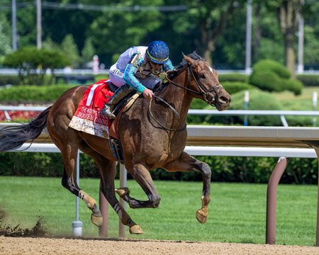 Book'em Danno wins the Woody Stephens Stakes at Saratoga Race Course