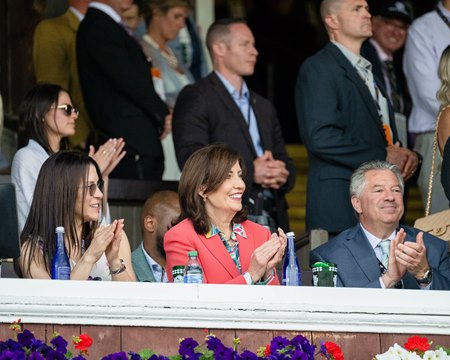 New York governor Kathy Hochul (middle) and NYRA chairman of the board of directors Marc Holliday (right) at the Belmont Stakes at Saratoga Race Course