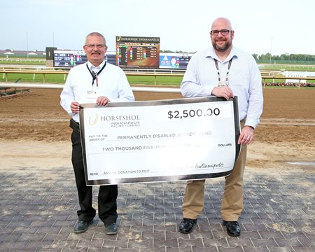 Horseshoe Indianapolis presents a check for $2,500 to the Permanently Disabled Jockeys Fund
