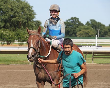 Jockey Chris Elliott smiles after Reclusive gave him his first stakes win as a jockey in the Regret Stakes at Monmouth Park