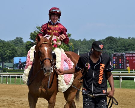 Nakatomi enters the winner's circle following his victory in the Alfred G. Vanderbilt Handicap at Saratoga Race Course