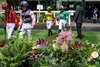 The jockeys walk into the parade ring for the 6f Fillies&#39; Novice Stakes
Ascot 26.7.24 Pic: Edward Whitaker