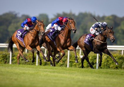 Buttons (Ryan Moore,centre) gets up to the 7f fillies maiden from Content and Serious Notions. Leopardstown.
Photo: Patrick McCann/Racing Post
08.06.2023
