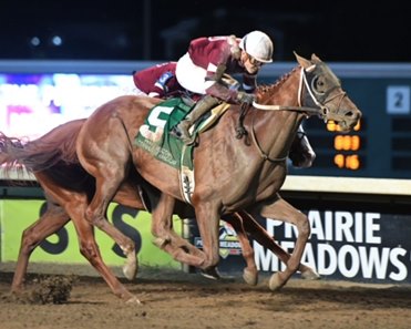 Red Route One catches Unload to win the Prairie Meadows Cornhusker Handicap at Prairie Meadows