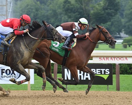 Briland, a daughter of first-crop sire McKinzie, wins her debut by a neck at Saratoga Race Course
