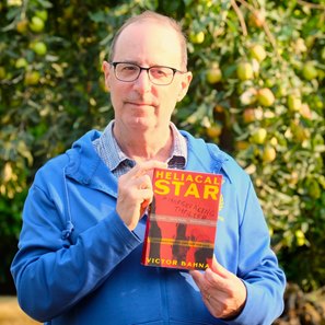 Victor Bahna with his book Heliacal Star