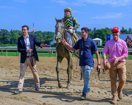 Dylan Davis leads Pandagate to the winner's circle after the Albany Stakes at Saratoga Race Course