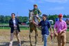 Assistant trainer Miguel Clement on left. Pandagate with Dylan Davis wins the Albanyt at Saratoga on Aug. 25, 2024. 