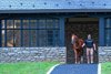 walking to his paddock from the stallion barn
Curlin with stallion manager Lance Mitchell  at Hill ’n’ Dale Farm at Xalapa near Lexington, Ky, on  Sept. 26, 2024. 