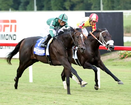 Deterministic and rider Manny Franco (outside) defeat Grand Mo the First in the Virginia Derby at Colonial Downs