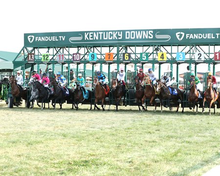 Horses break from the starting gate in front of the stands at Kentucky Downs
