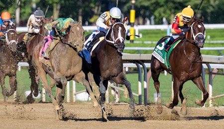 Ferocious (center) battles inside of victorious Chancer McPatrick on his way to finishing second in the Hopeful Stakes at Saratoga Race Course