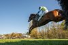 Snap Decision with jockey Graham Watters aboard leads the field over the last fence and on to the win in the American Grand National G1 at the 103rd Far Hills Race Meeting at Far Hills Race Course in Far Hills, New Jersey 
Saturday Oct. 19, 2024.  Photo by Skip Dickstein