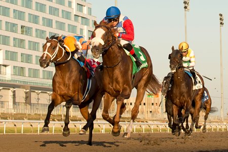 Dresden Row holds off Bail Us Out (outside) to win the Ontario Derby at Woodbine