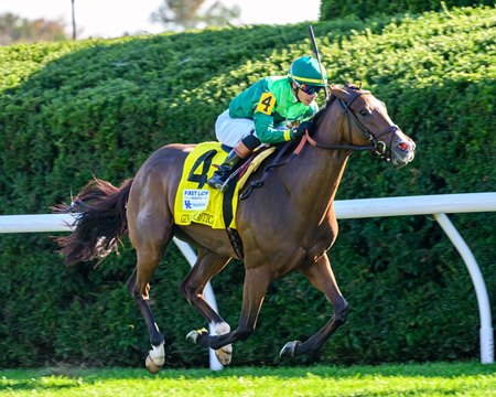 Gina Romantica finishes in a drive to win the First Lady Stakes at Keeneland