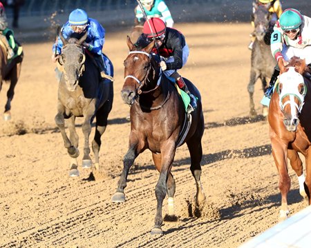 Render Judgment (red cap) breaks his maiden at Churchill Downs