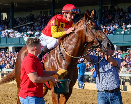 Luan Machado celebrates his Perryville victory aboard Brunacini at Keeneland