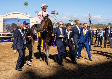 Several of Sierra Leone's owners lead the colt into the winner's circle after a victory in the Breeders' Cup Classic at Del Mar 