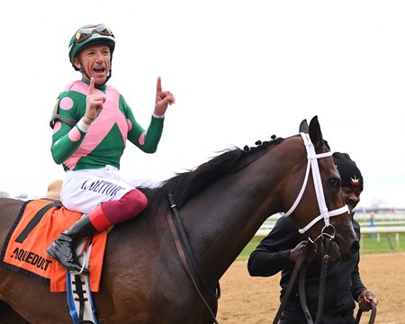 Jockey Frankie Dettori celebrates aboard Be Your Best after winning the Long Island Stakes at Aqueduct Racetrack