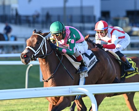 No Mo Candy withstands a stretch rally from Oversubscribed to win the Pebbles Stakes at Aqueduct Racetrack