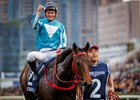 Romantic Warrior and James McDonald after winning the 2023 Hong Kong Cup at Sha Tin Racecourse