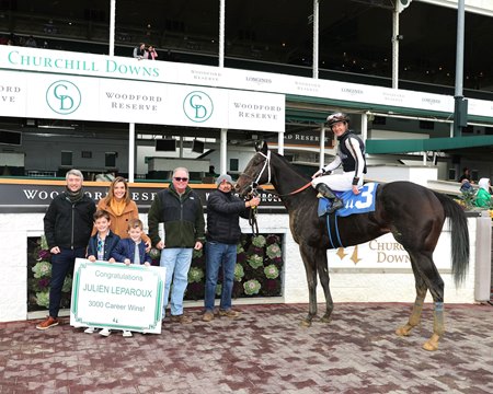 Julien Leparoux and family celebrating in the winner's circle after Race 3 at Churchill Downs