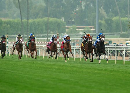 Artislas and Flavien Prat, second from right, win the $100,000 Eddie Logan Stakes