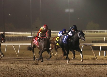 Coal Battle (left) runs down Speed King in the stretch of the 2024 Remington Springboard Mile Stakes at Remington Park